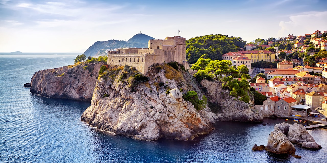 A castle on a rocky bluff jutting out into the sea near the city of Dubrovnik, Croatia