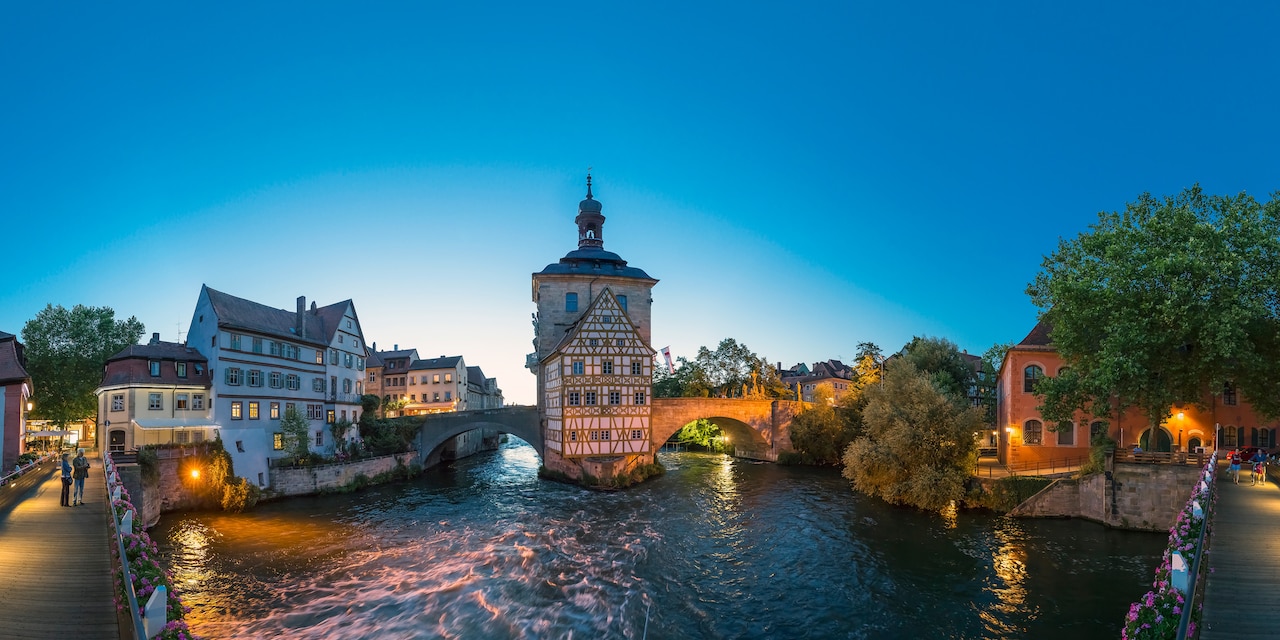 The Old Town Hall in Bamberg with the Regnitz River flowing under its bridge