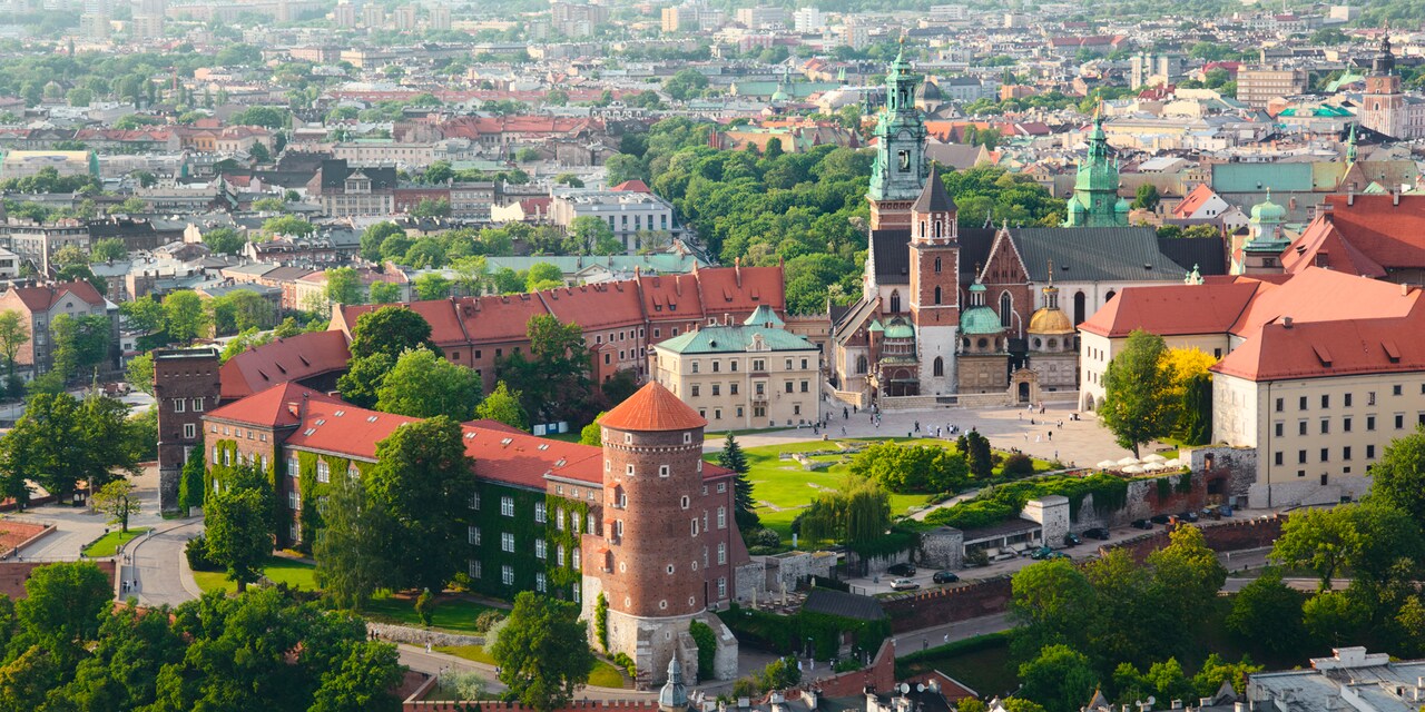 An aerial view of Krakow, Poland with Wawel Castle and Wawel Cathedral in the foreground
