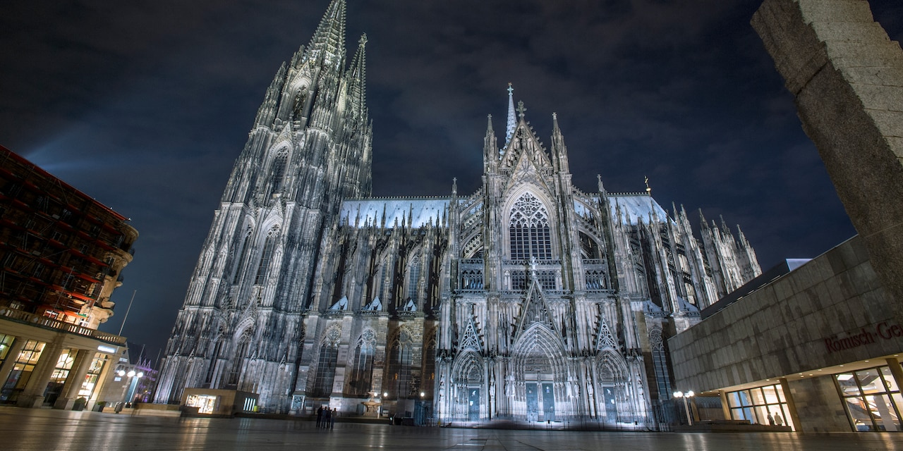 The Gothic, spotlighted Cologne Cathedral at night