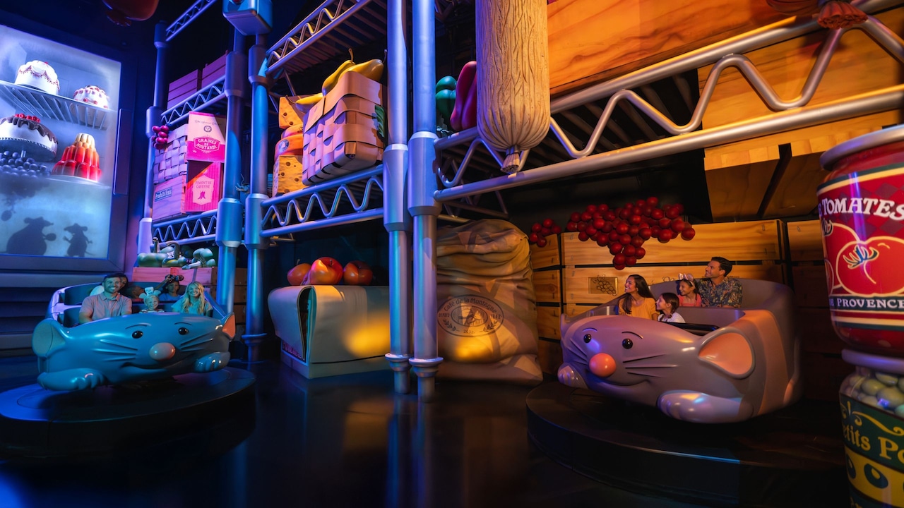 2 ride vehicles carry Guests through the giant kitchen of Gusteau’s restaurant on Remy's Ratatouille Adventure