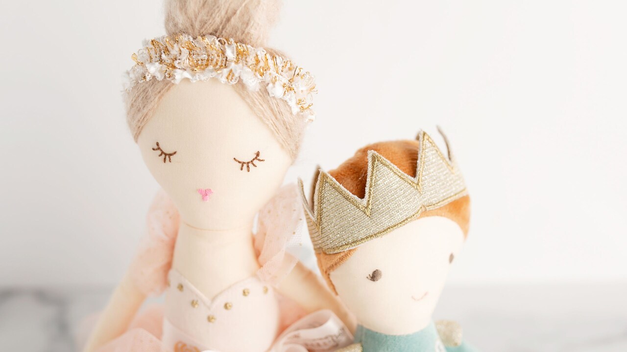 Two cloth dolls of a princess and a prince