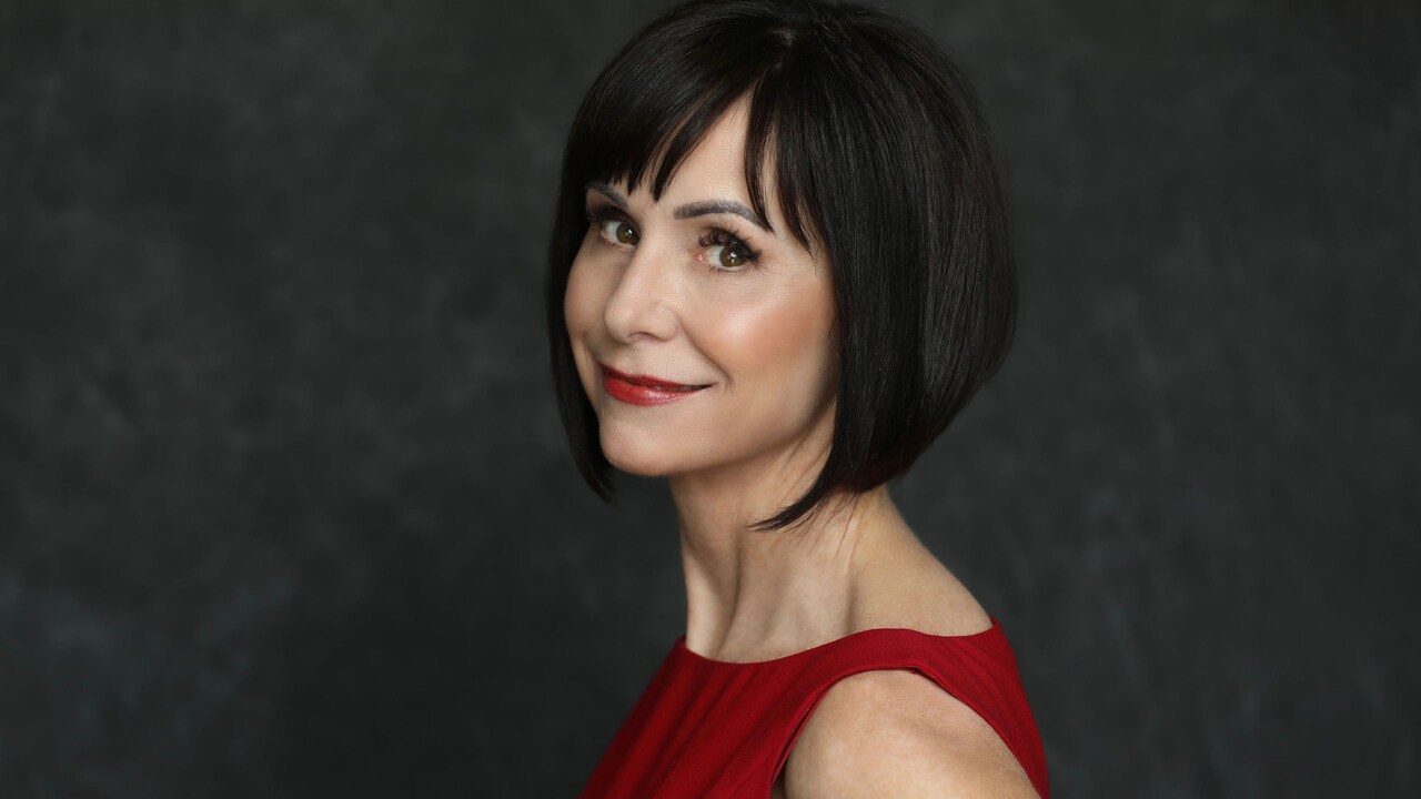 Una foto de Susan Egan