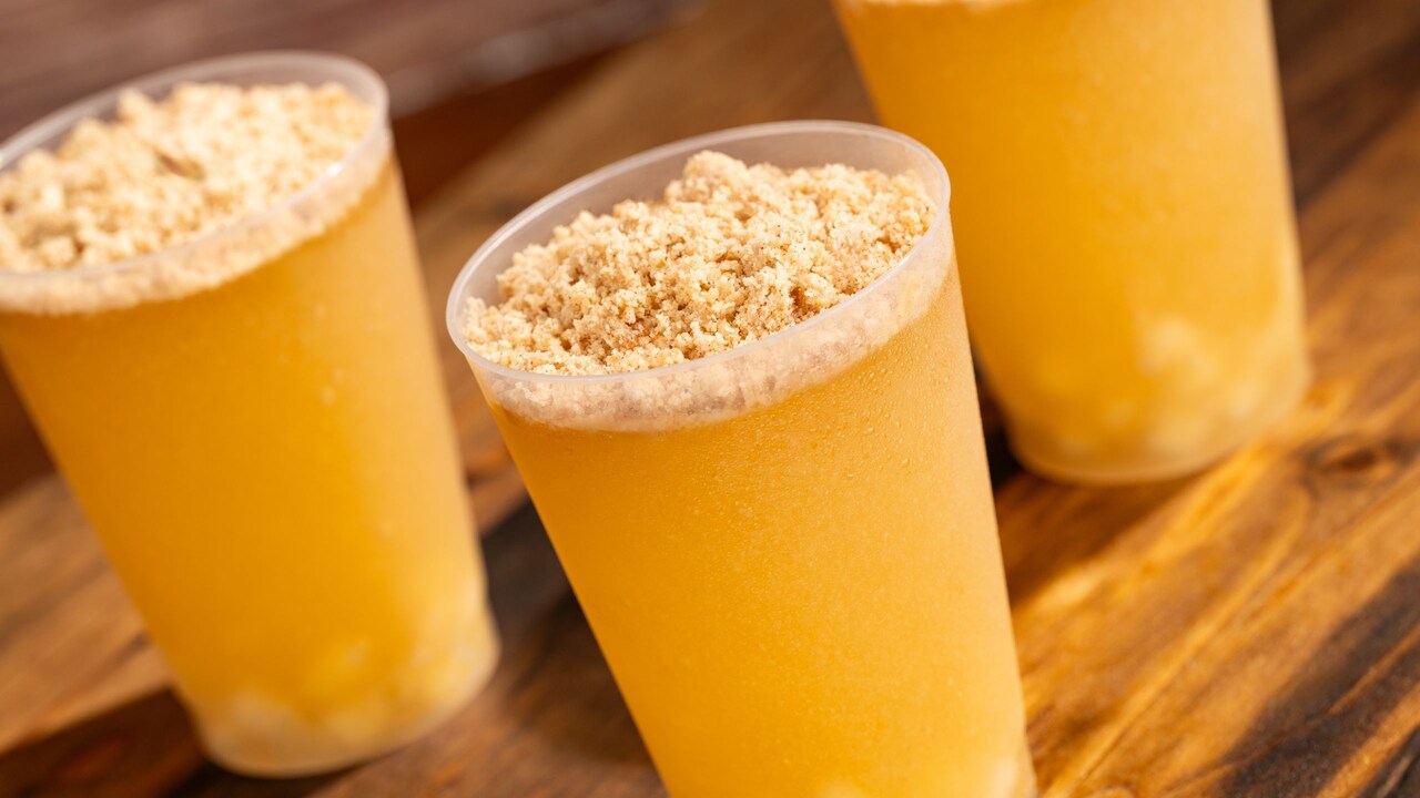 Cups of Szarlotkcha, with apple pie filling and apple cinnamon cider topped with streusel