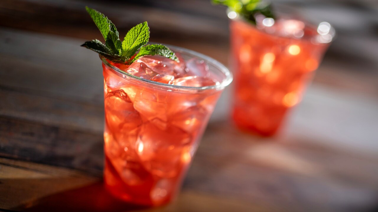 Cups of Northern Ruby drink, with Rhubarb liqueur, vodka, strawberry, ginger and lime