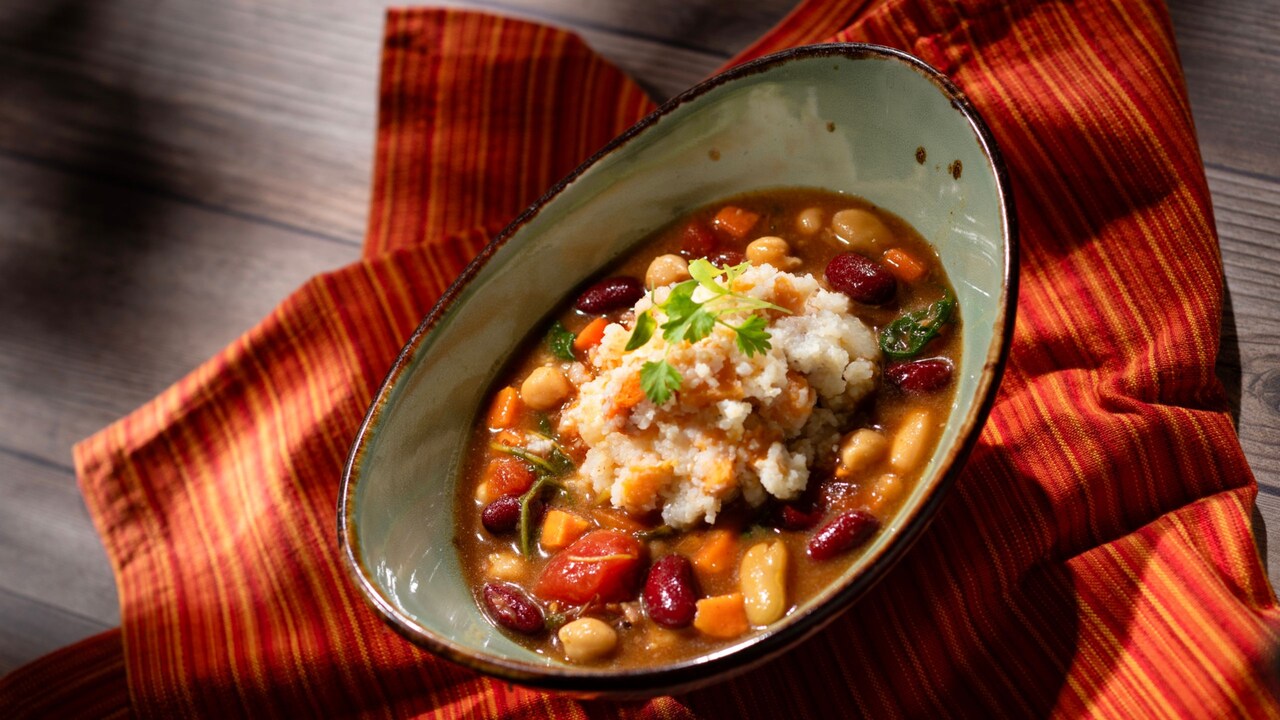 Sweet Potato Mealie Pap, with a stew of beans, peppers, carrots and tomatoes
