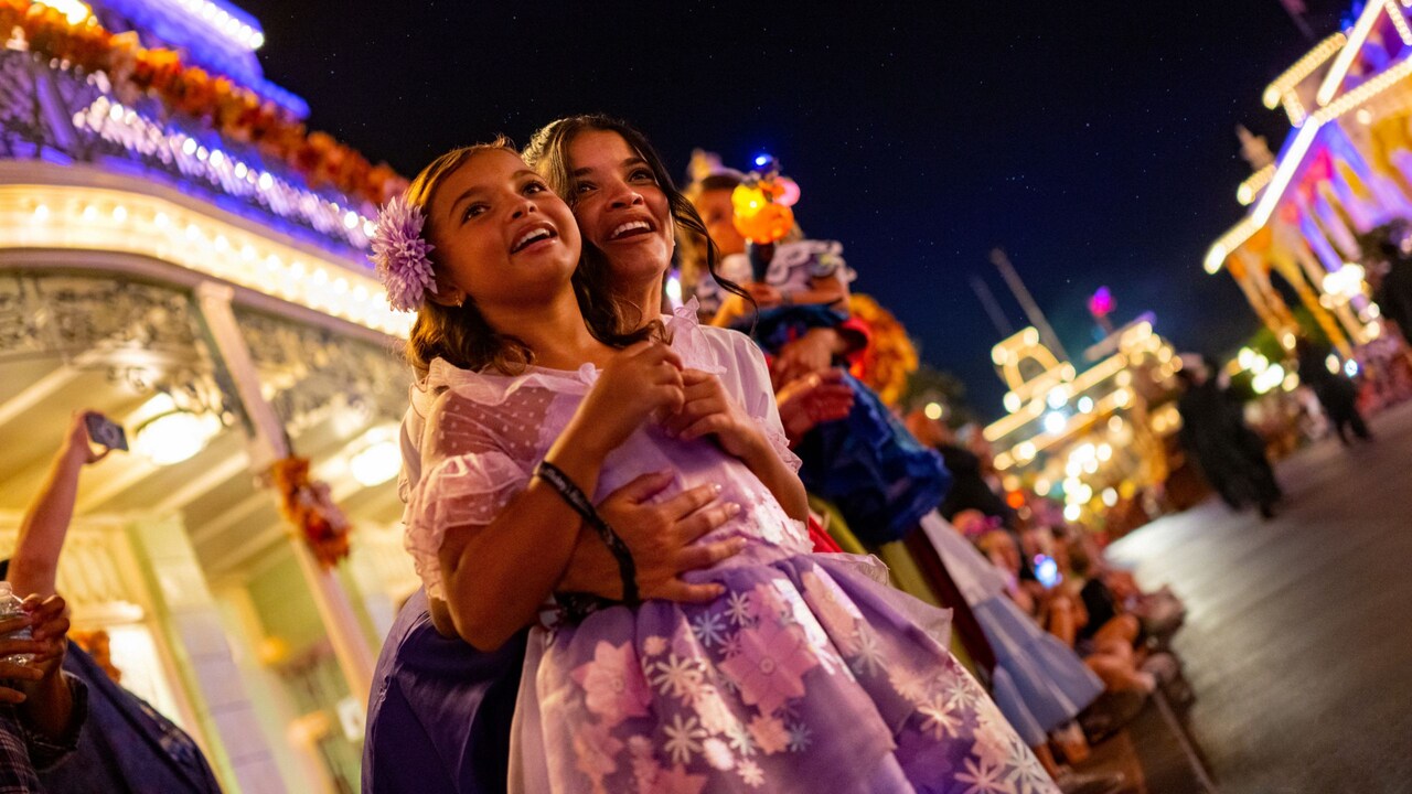 Mickey and Minnie wear Halloween costumes during Mickey's Not-So-Scary Halloween Party at Walt Disney World