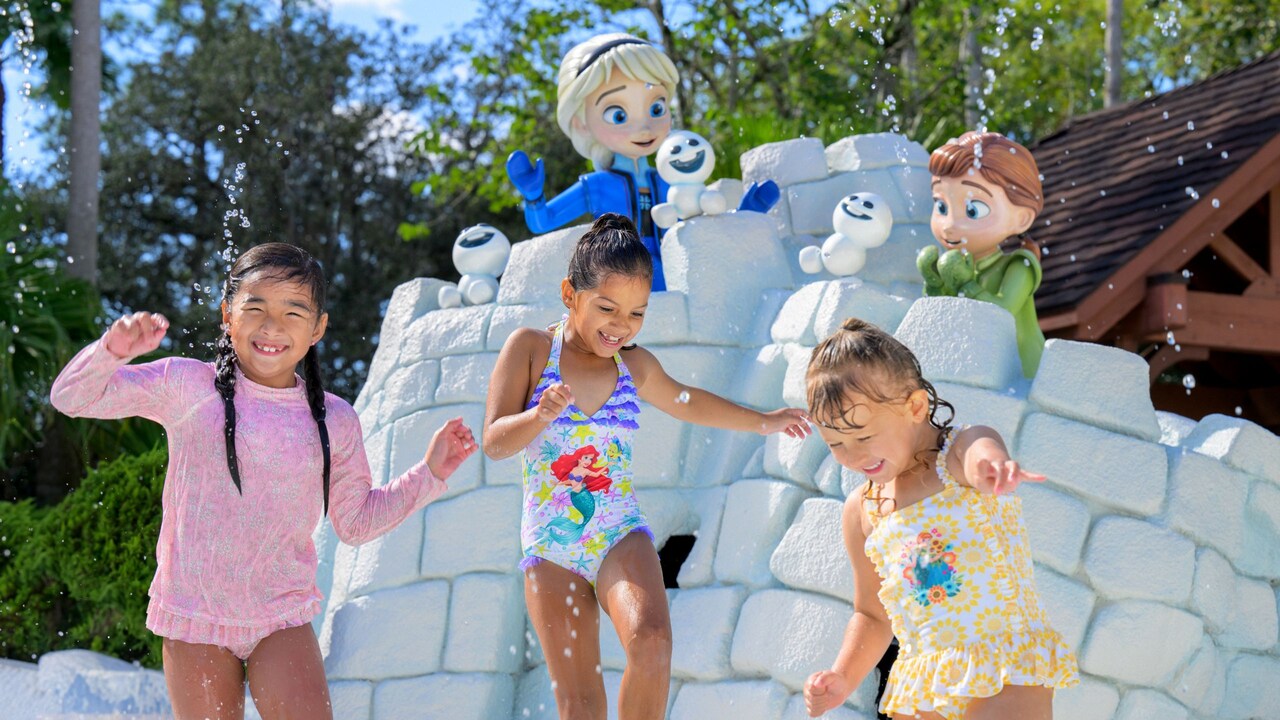Three young girls playing at Tike’s Peak play area at Disney’s Blizzard Beach water park