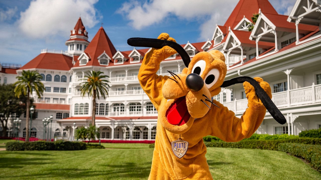 Pluto posing in the courtyard at Disney's Grand Floridian Resort