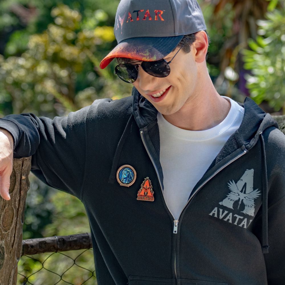 A Guest in an Avatar Fire and Ash zip up hoodie and cap at Pandora The World of Avatar in Disney's Animal Kingdom theme park