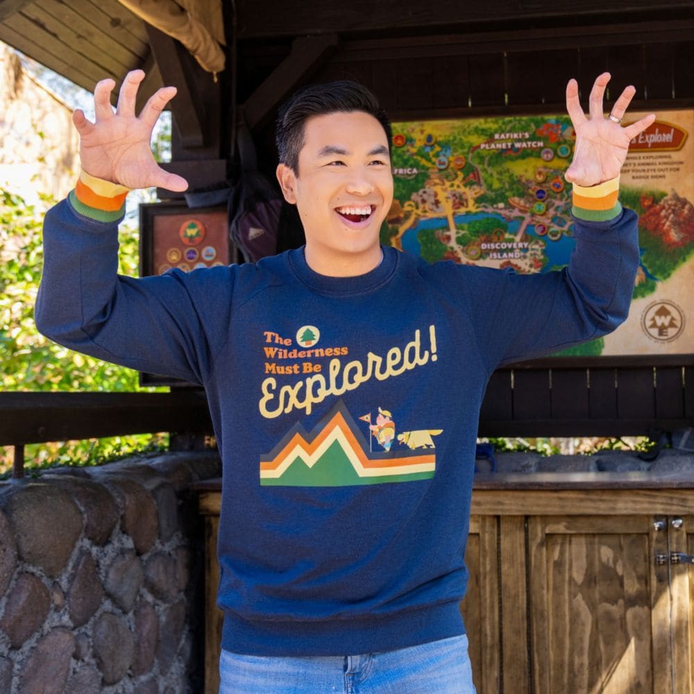 A Guest wearing an Up themed sweatshirt