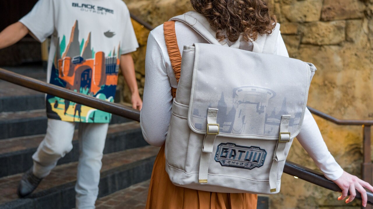 Two Guests wearing Star Wars themed merchandise at Disney's Hollywood Studios theme park