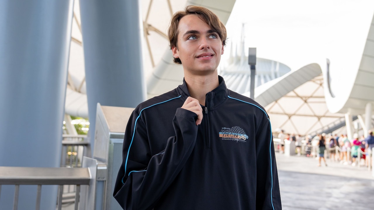 A man wearing a Space Mountain embroidered patch