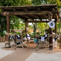 Beachcomber Shack 5, a shaded private cabana with lounge chairs at Disney's Typhoon Lagoon water park