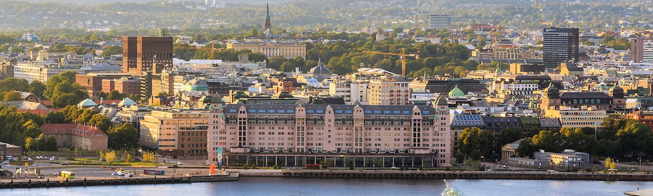The city of Oslo along the banks of a river The city of Oslo along the banks of a river
