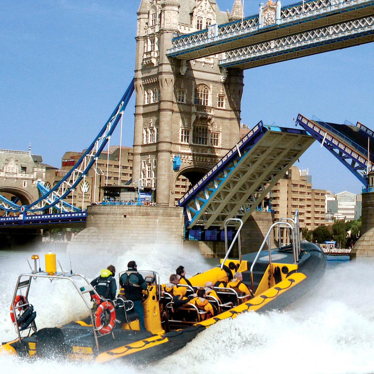 A speedboat races towards Tower Bridge on the Thames River A speedboat races towards Tower Bridge on the Thames River