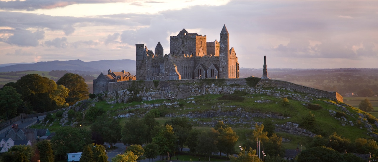 The Rock of Cashel composed of medieval buildings with towers, gables and turreted walls
