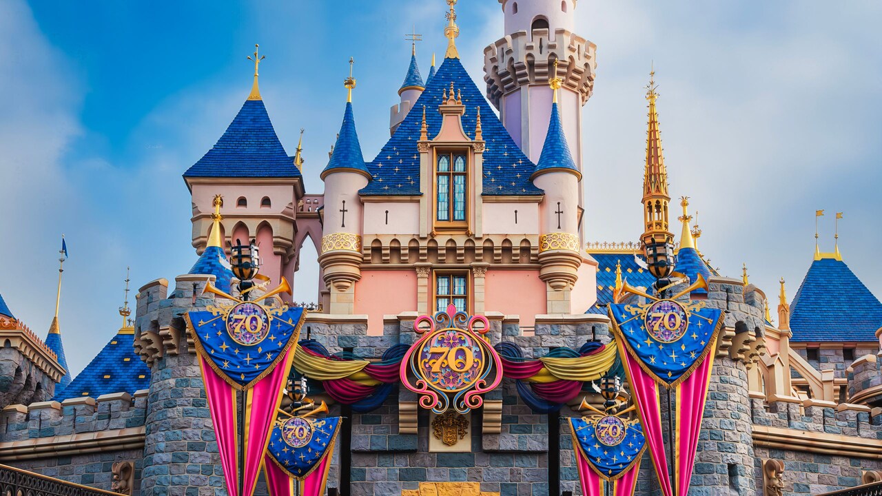 The Sleeping Beauty Castle at Disneyland Park with 70th Anniversary decorations