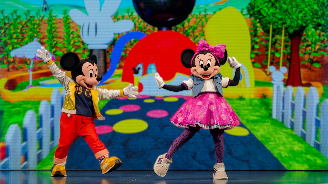 Mickey Mouse and Minnie Mouse dancing onstage during Disney Junior Mickey Mouse Clubhouse Live