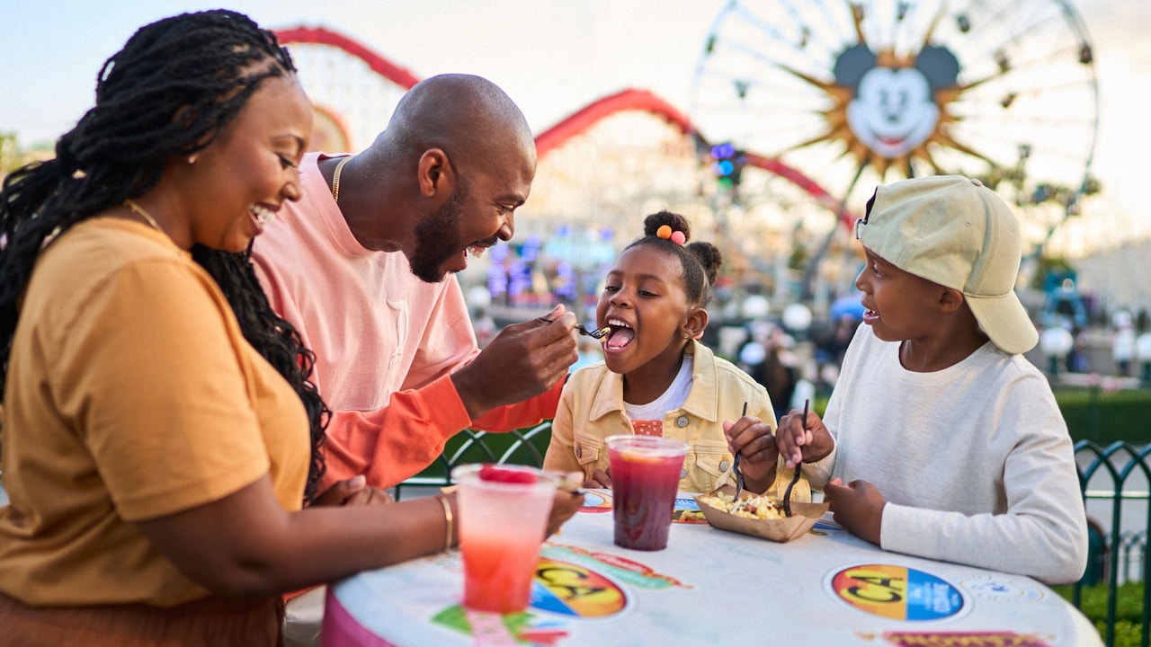 A family enjoying food and beverages at Paradise Gardens Park at Disney California Adventure Park