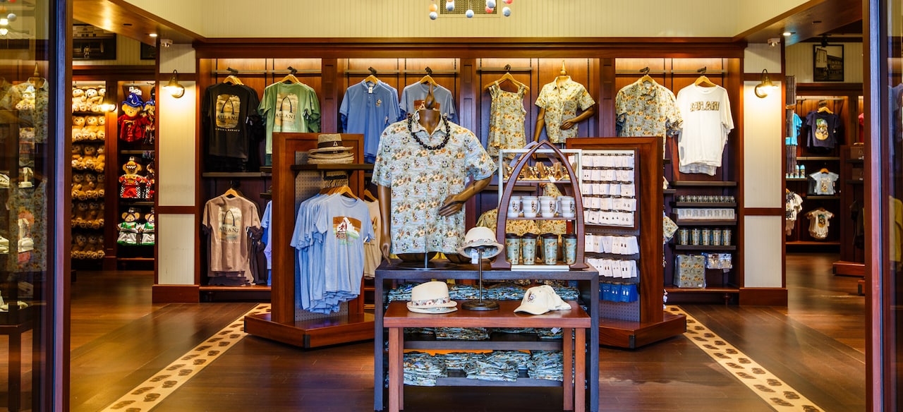Disney-themed resort wear, mugs and jewelry displays inside Kalepa's Store, the Aulani lobby gift shop