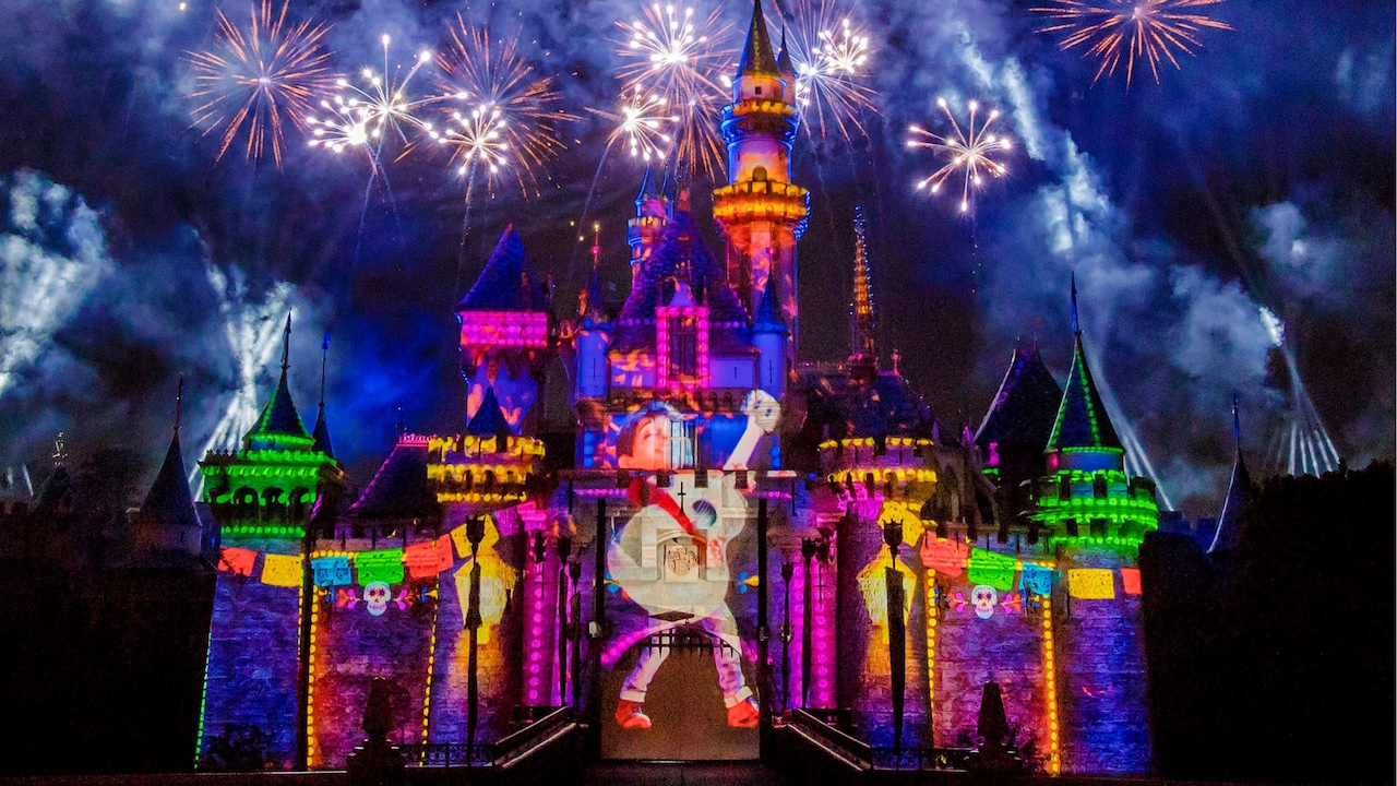 Fireworks and a dazzling projection of Coco on Sleeping Beauty Castle during the Together Forever A Pixar Nighttime Spectacular