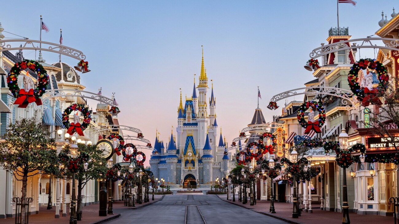 Main Street, U S A decorated for Christmas with Cinderella Castle in the distance