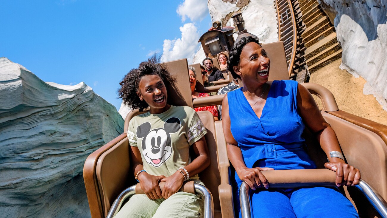 A mother and her daughter riding Expedition Everest at Disney's Animal Kingdom theme park