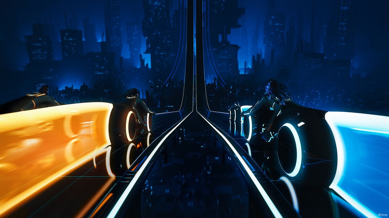 Guests ride towards a city during TRON Lightcycle Run