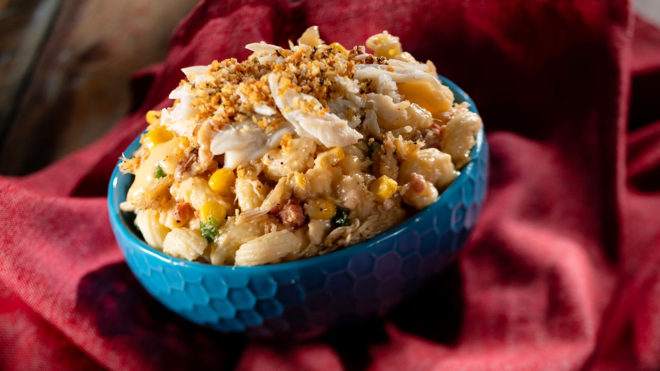 A bowl of Lump Crab and Corn Macaroni and Cheese topped with herbed panko