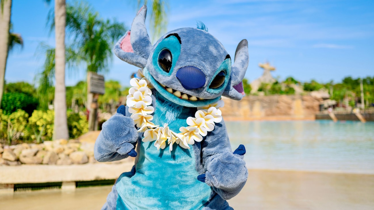 Stitch posing while wearing a Hawaiian lei at Disney's Typhoon Lagoon water park