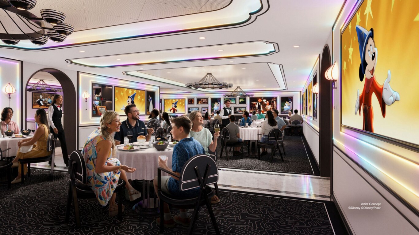 The dining room at the Animator’s Table restaurant, featuring artwork from Disney films on the walls