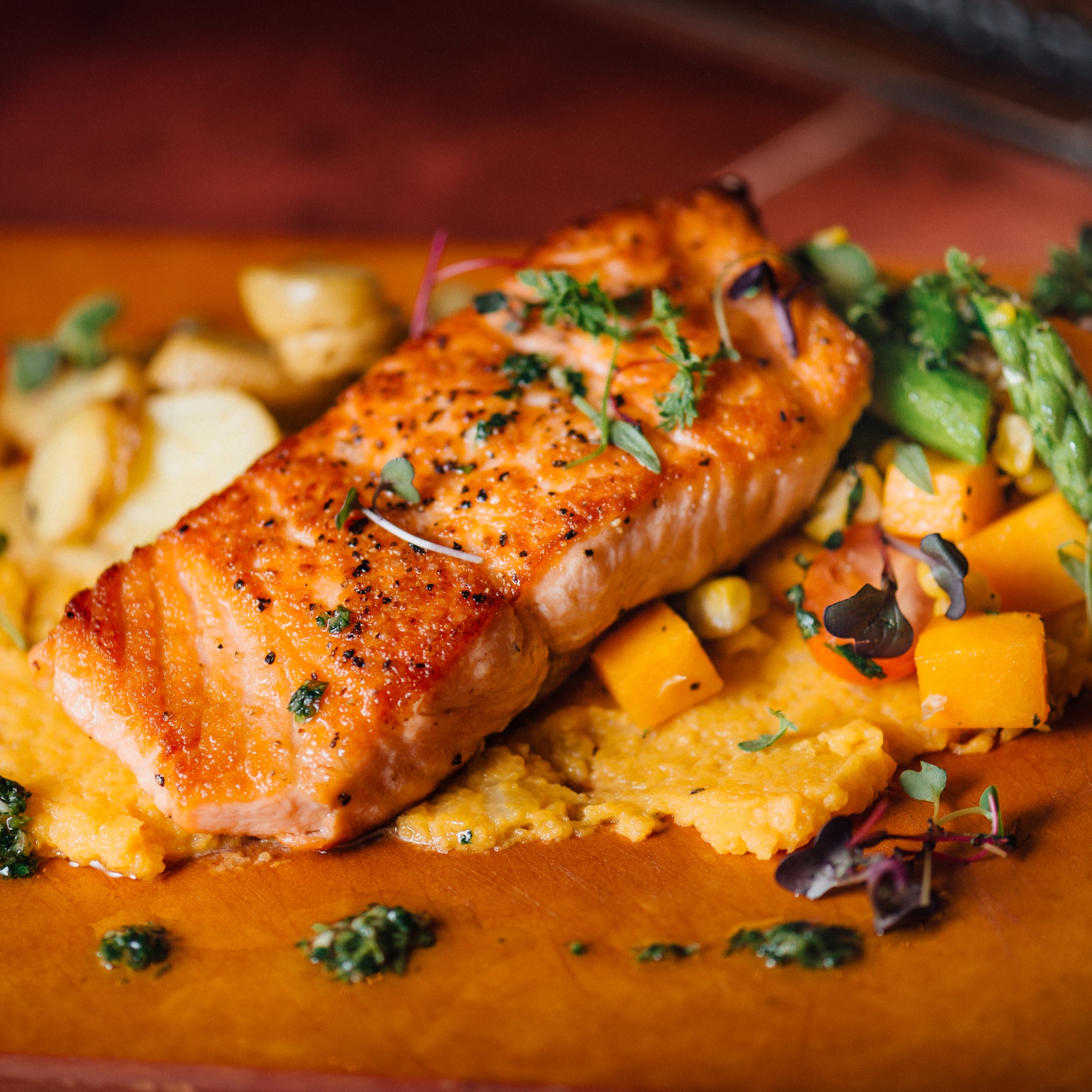 Our Pan-Seared Salmon entrée makes an excellent choice for lunch or dinner. slide 53 of 12 The Pan Seared Salmon entrée