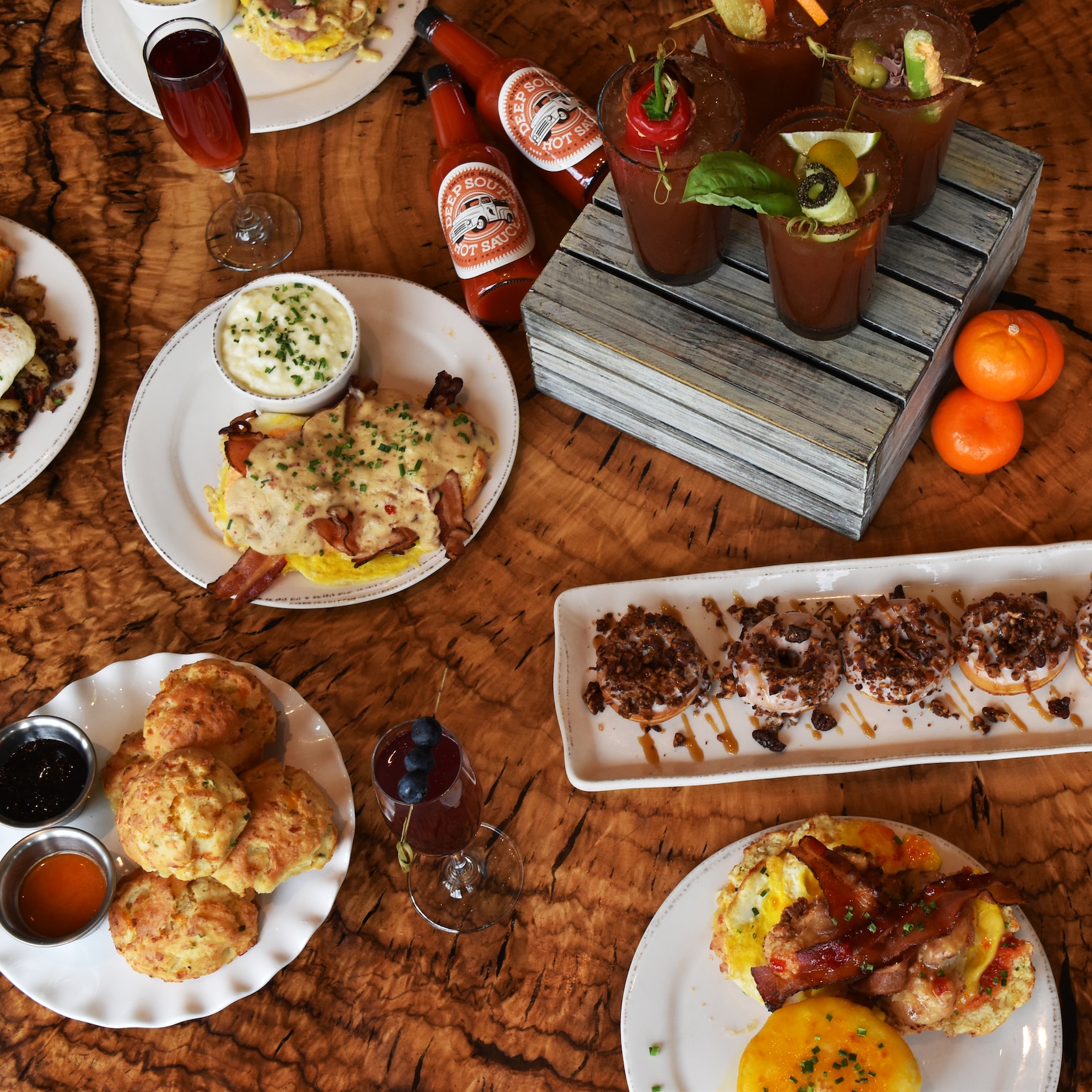 Dig into irresistible comfort food during the Rise ‘n Shine Brunch—every every Saturday and Sunday from 10:00 AM to 2:00 PM. slide 33 of 7 Assorted breakfast cocktails and dishes including bacon and pecan doughnuts, biscuits and jam and eggs