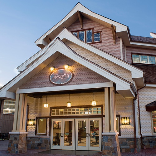 Amorette’s is your destination for baked goods as breathtakingly beautiful as they are mouthwateringly delicious. slide 18 of 4 The 2-story building housing Amorette’s Patisserie features gingerbread style siding, a roof with 3 sharp-peaked gables and a covered portico with 2 sets of double entry doors