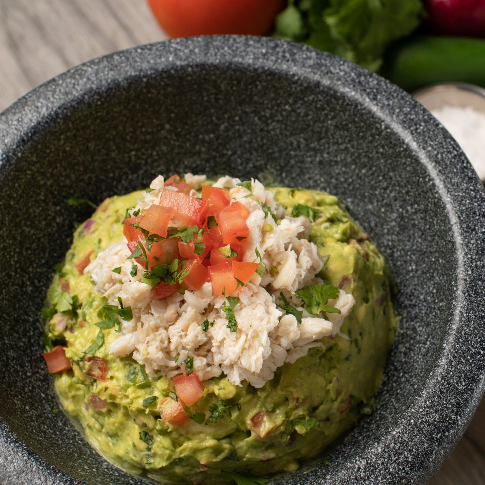Treat yourself to delicious Crab Guacamole, served with Tajin tortilla chips. slide 27 of 6 Crab Guacamole at Paddlefish, served with Tajin tortilla chips