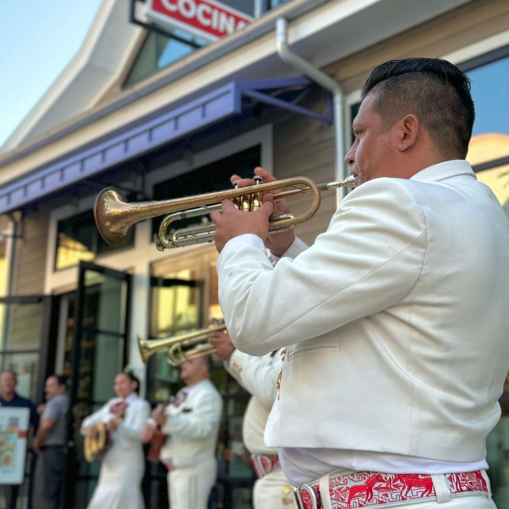 Get a glimpse of the vibrant traditions and culture of Mexico, beyond its delicious food. slide 68 of 16 Musicians from a Mariachi band performing outside of Frontera Cocina