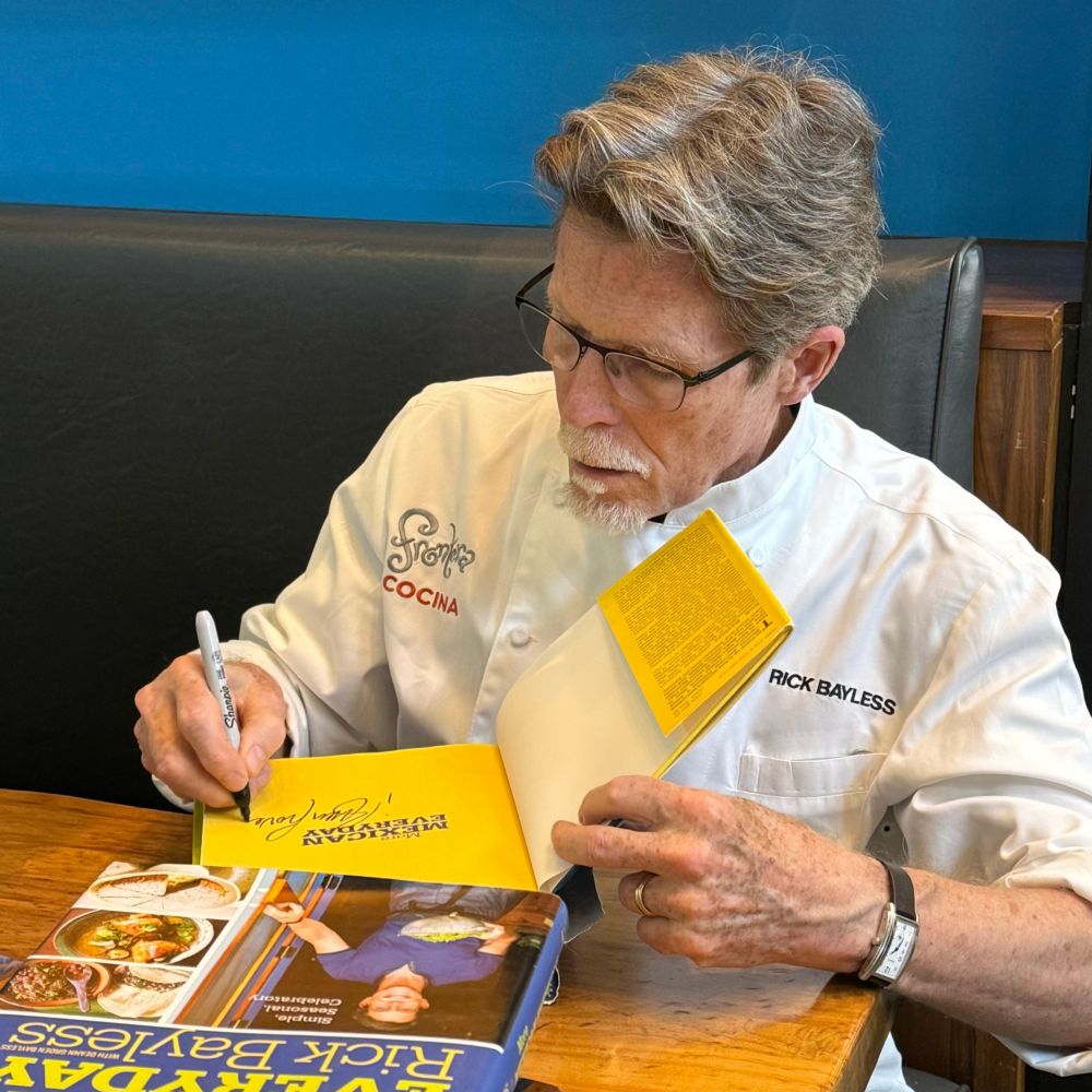 Meet Rick Bayless, the mastermind behind the feast of flavors at Frontera Cocina slide 71 of 16 Celebrity chef Rick Bayless signing copies of his book at Frontera Cocina