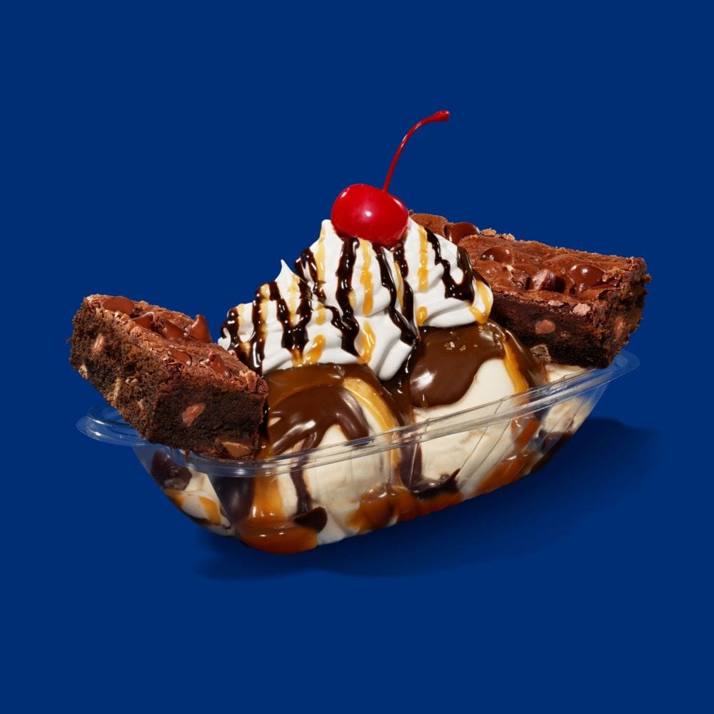 Sink your teeth into decadent brownies in the Lands End Salted Caramel Brownie Sundae. slide 30 of 6 Vanilla ice cream topped with whipped cream, hot fudge and caramel sauce served with brownies