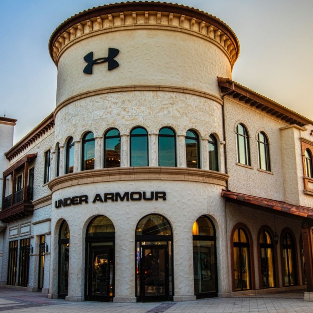 A large building with a sign that says ‘Under Armour’