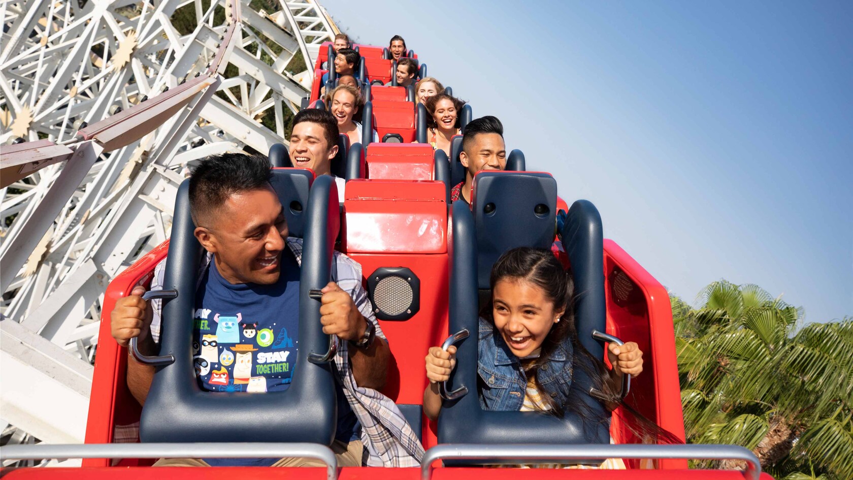 Guests hang on, riding Incredicoaster