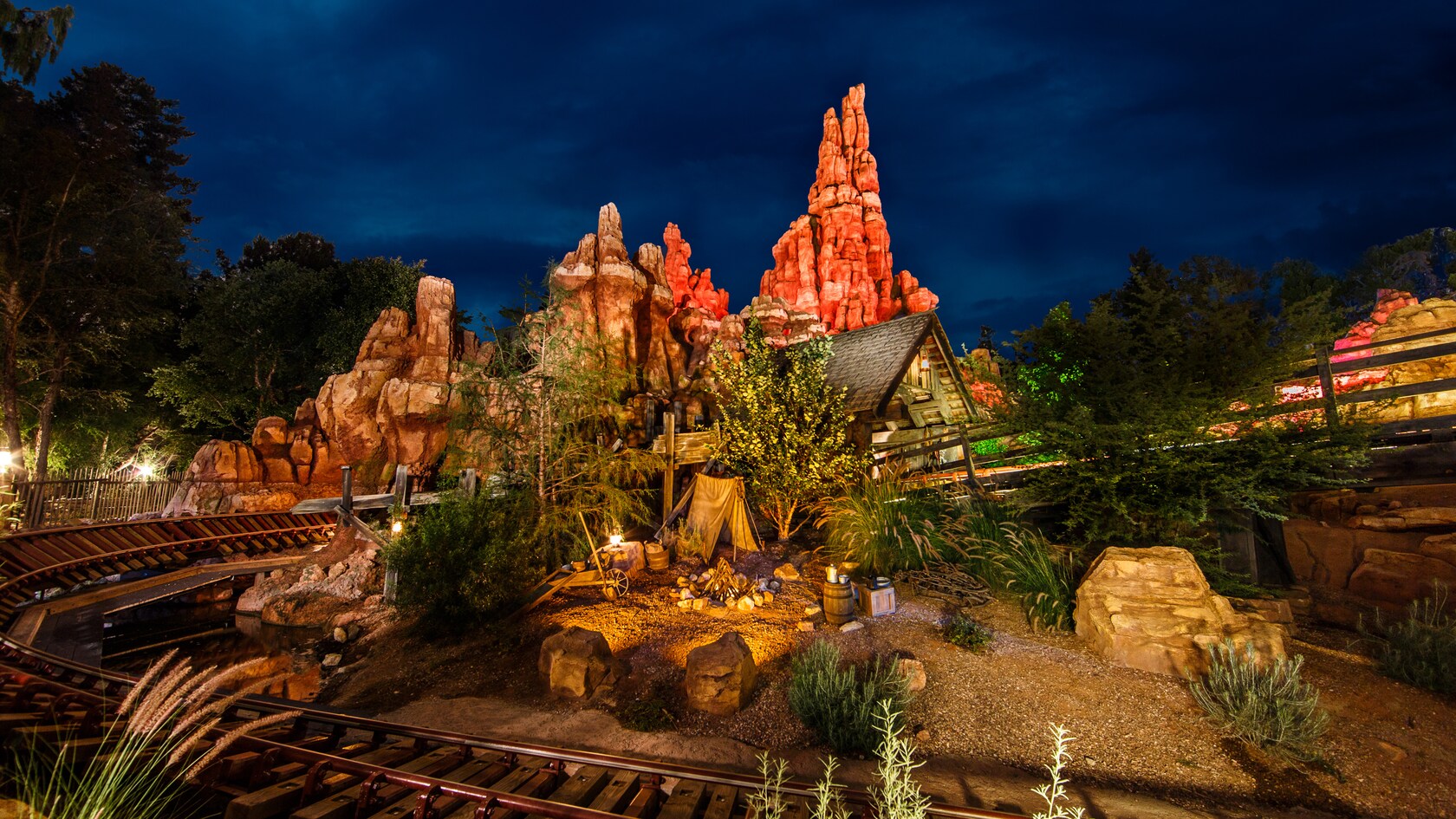 A section of Big Thunder Mountain Railroad with a hairpin curve and a campground