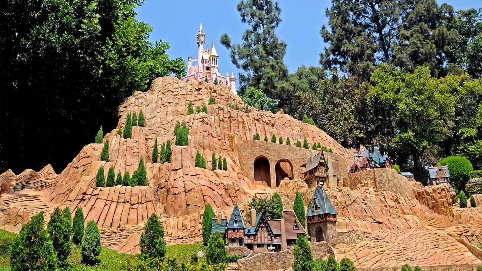 A miniature model of the French village from Cinderella, with a mountaintop castle
