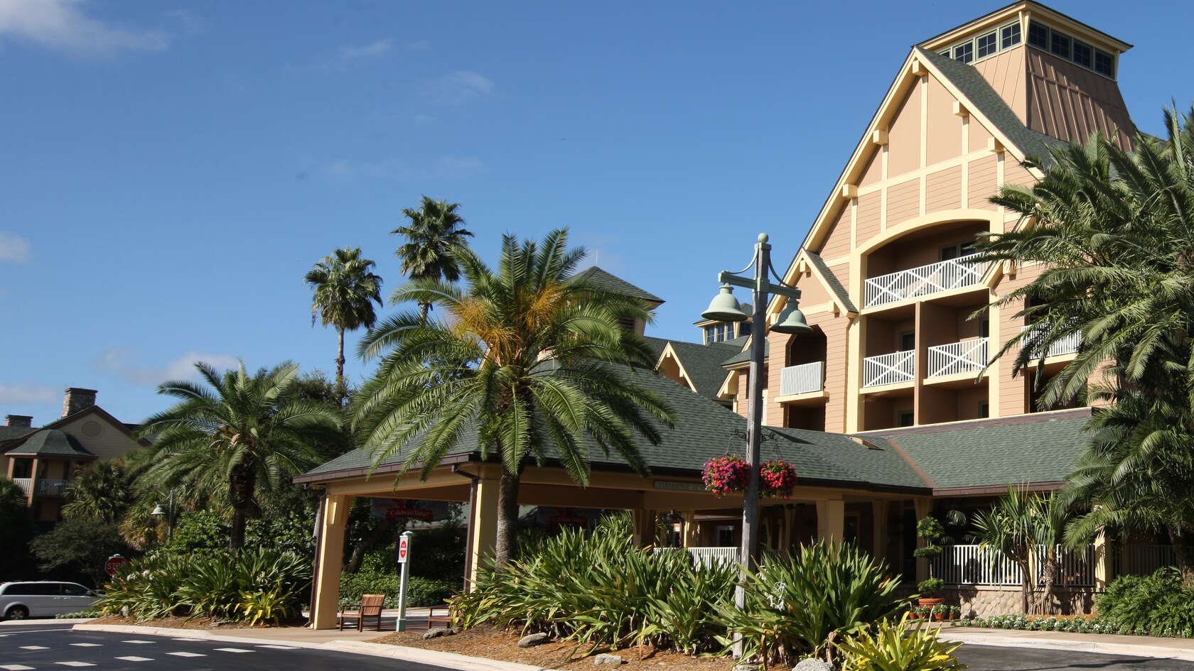 2 trams awaiting passengers at the parking lot