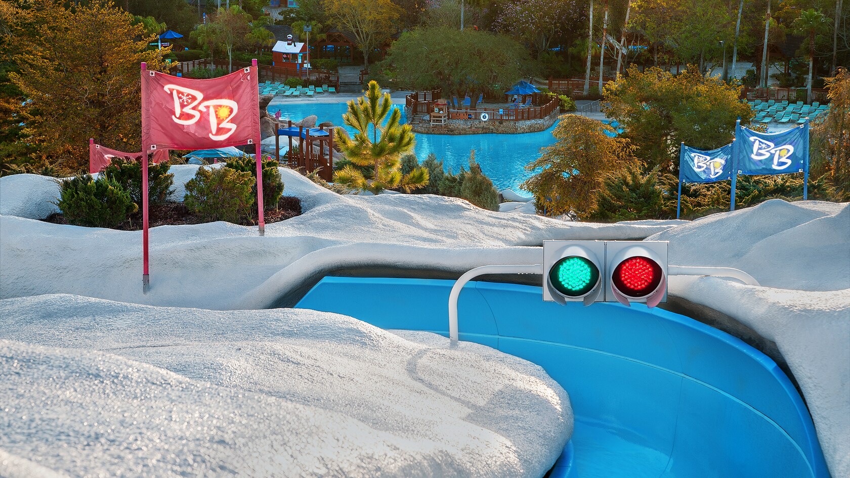The starting gate at Snow Stormers with a red and a green and a view of Melt-Away Bay below