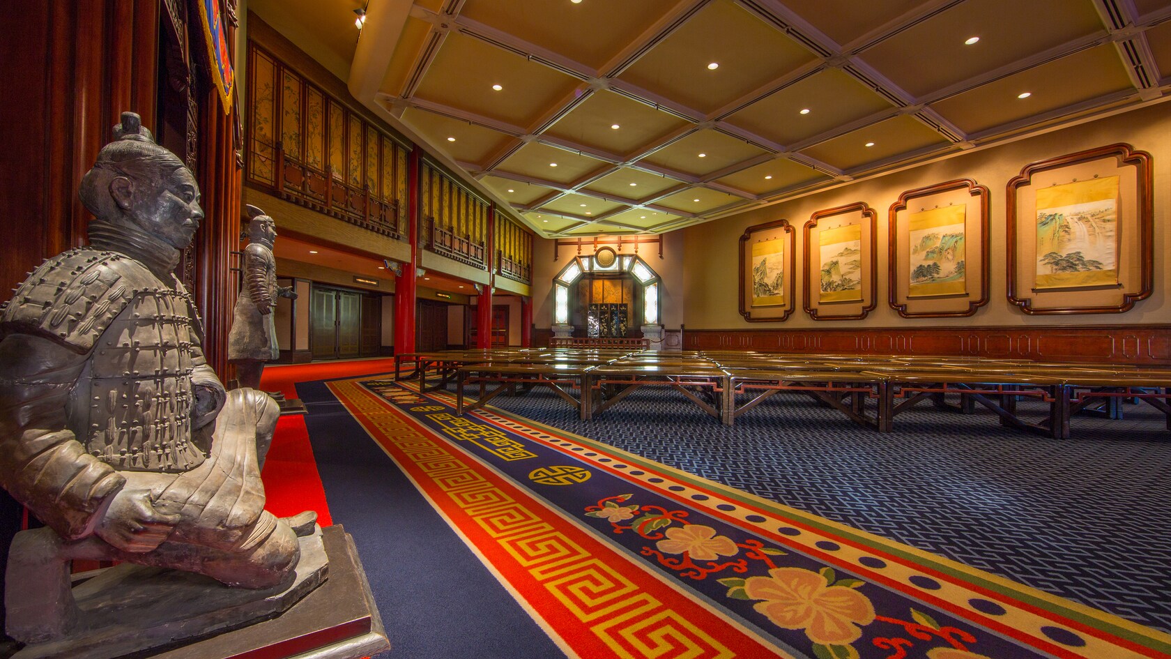 Lobby with Chinese sculptures and paintings at the theater showing 'Reflections of China'