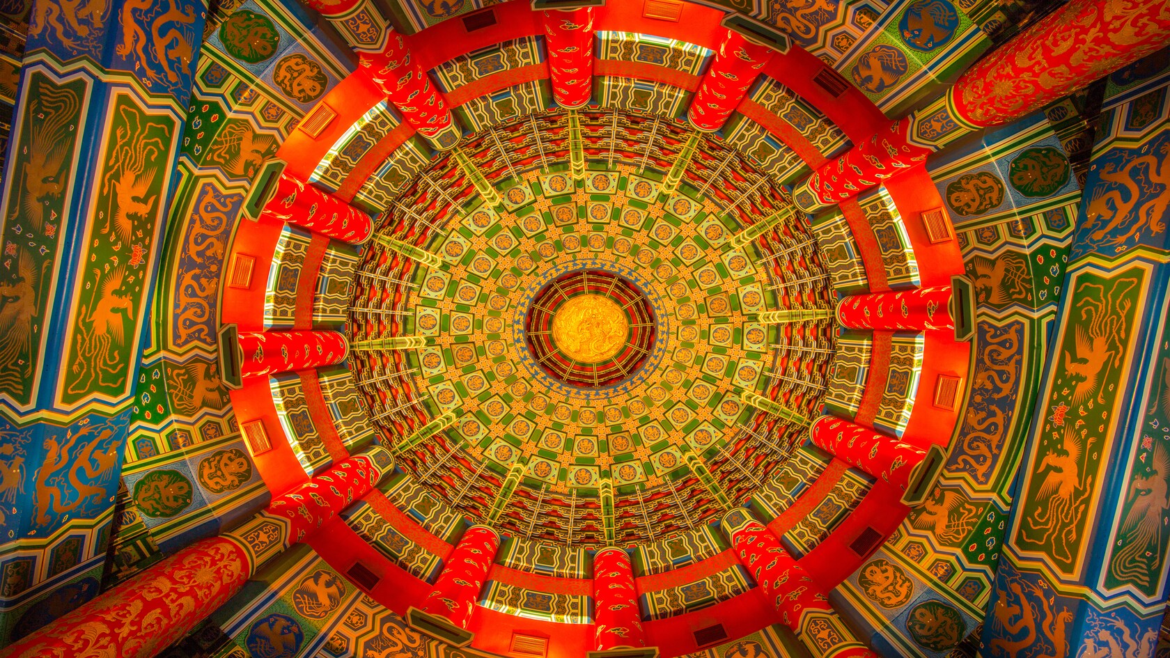The colorful and intricately designed ceiling in the rotunda section of the Temple of Heaven 