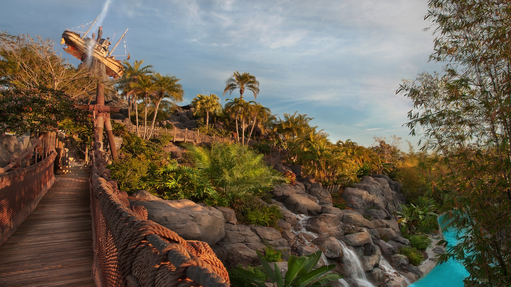 A foot bridge over Castaway Creek, with Miss Tilly atop Mount Mayday beyond