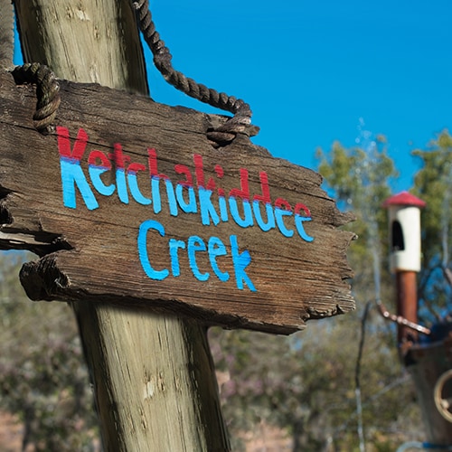 A wooden sign for Ketchakiddee Creek at Disney's Typhoon Lagoon water park