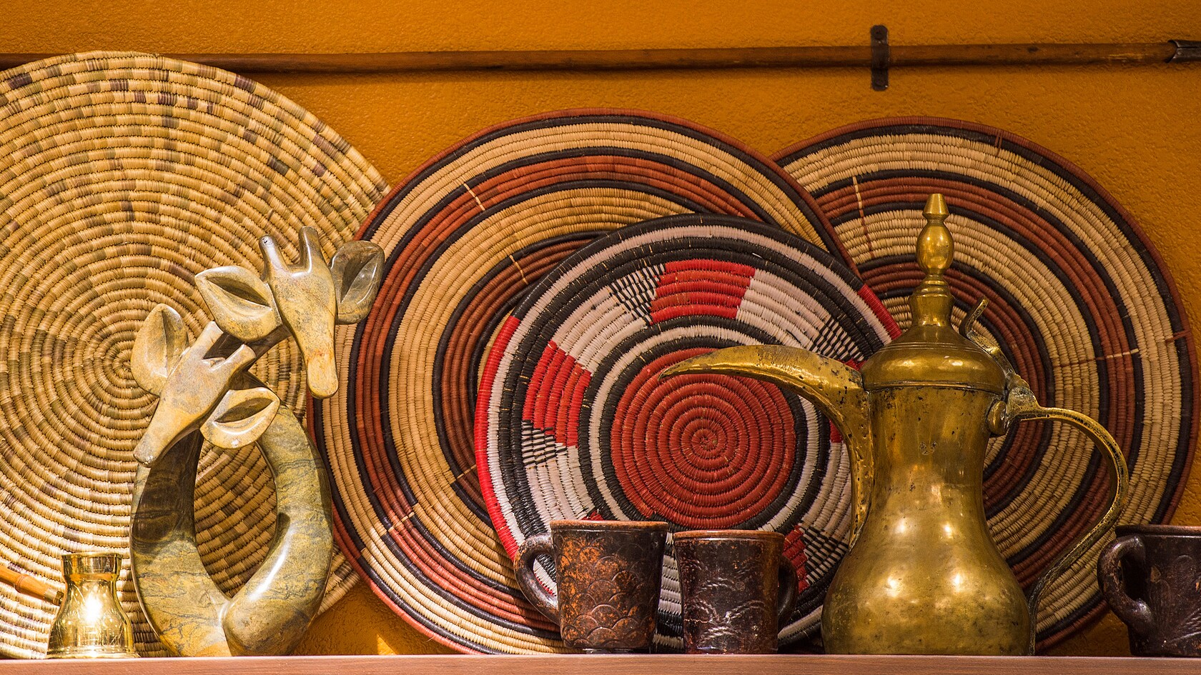 Handwoven placemats and authentic, hand-crafted African art and household items for sale